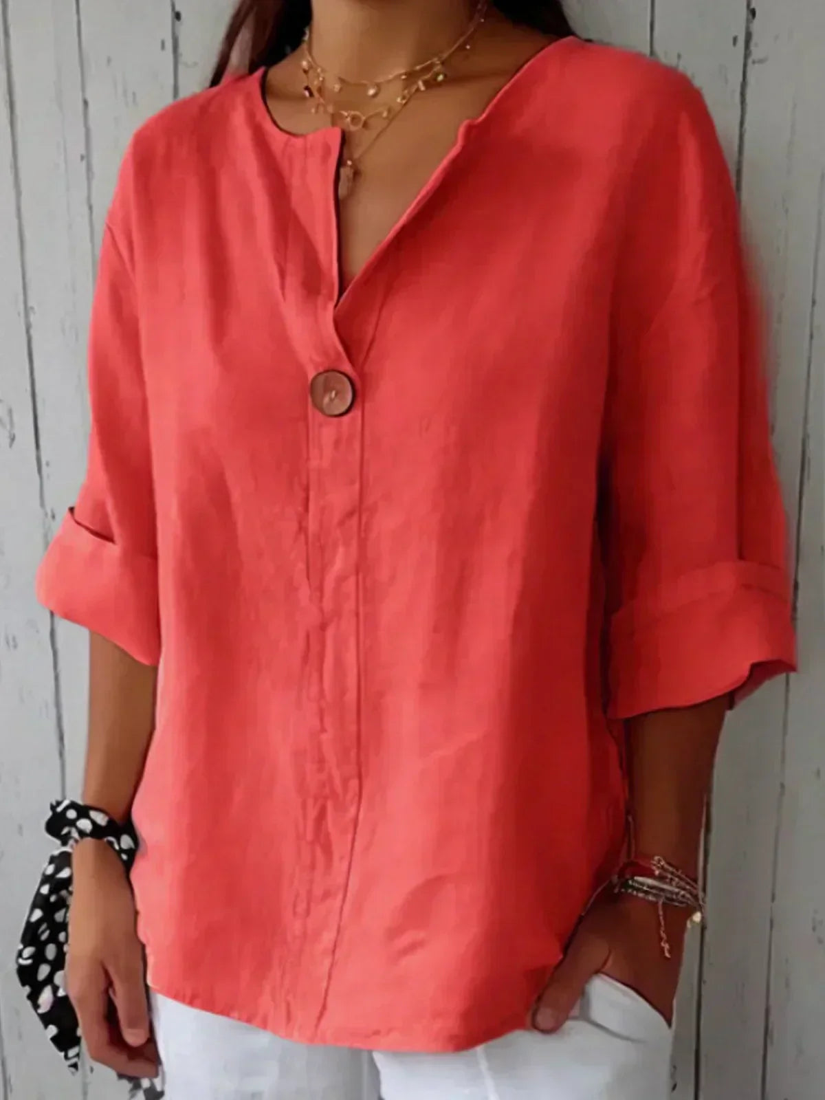 Blusa comprida com decote em V