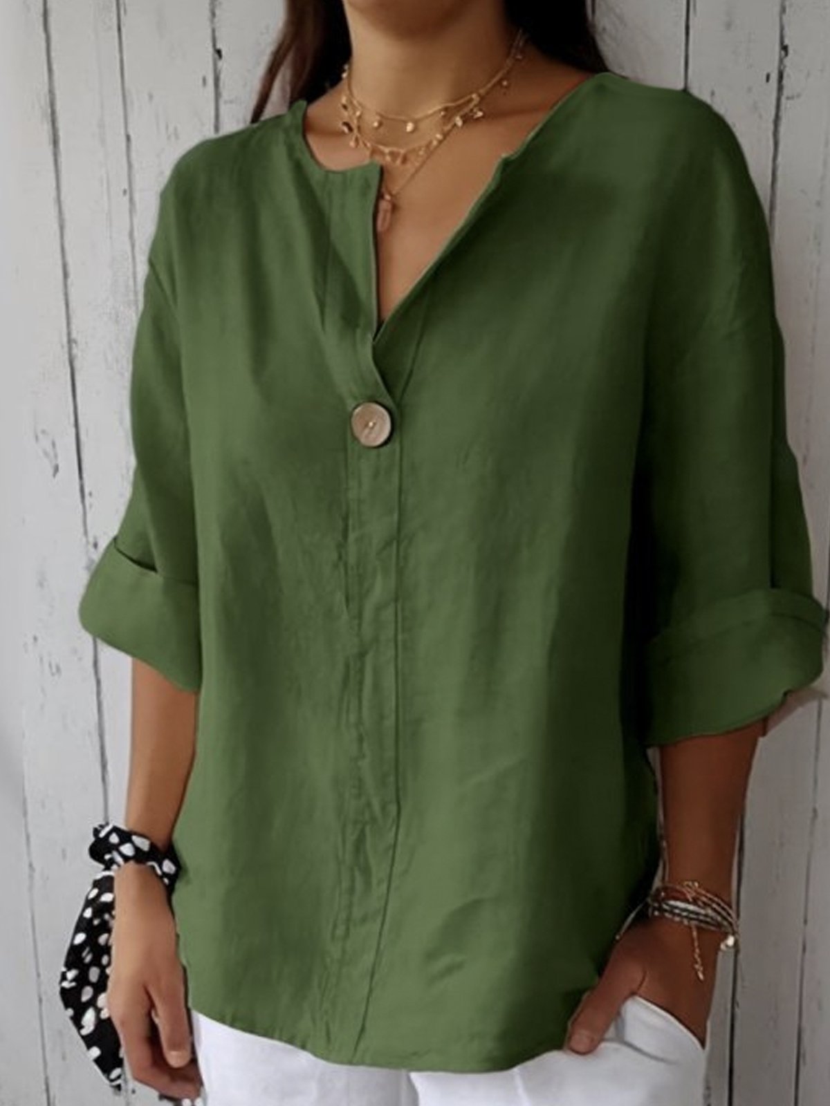 Blusa comprida com decote em V