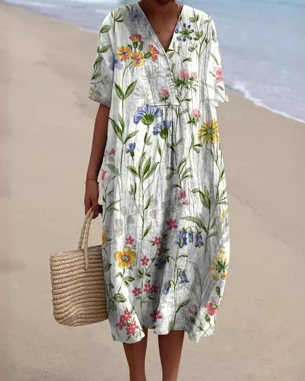 Vestido floral que cobre a barriga