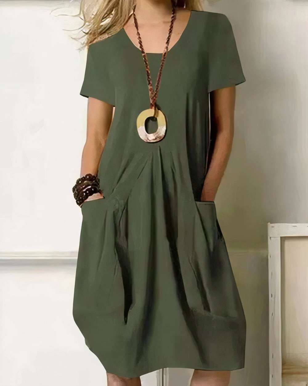 Vestido elegante que cobre a barriga