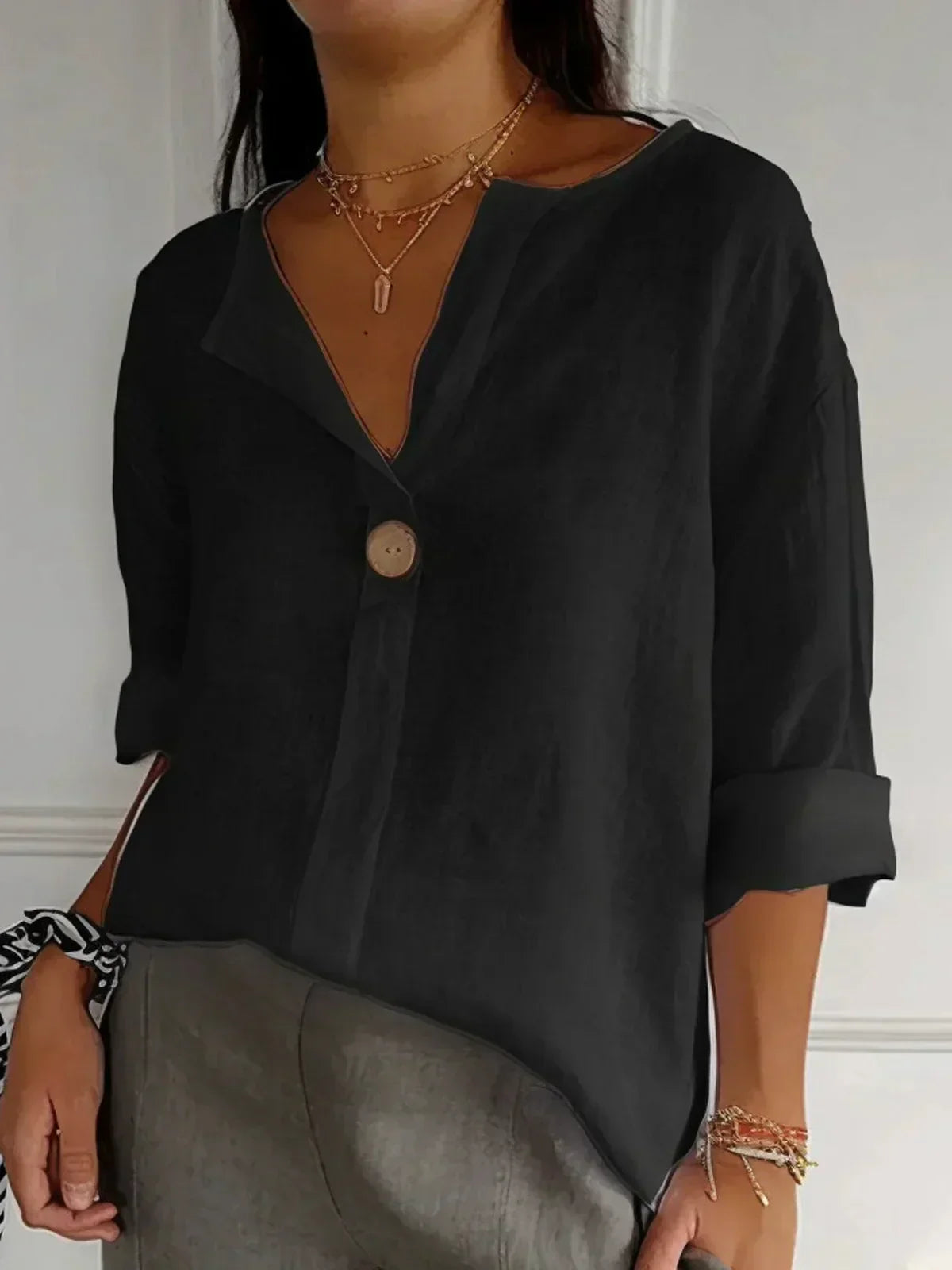 Blusa comprida com decote em V