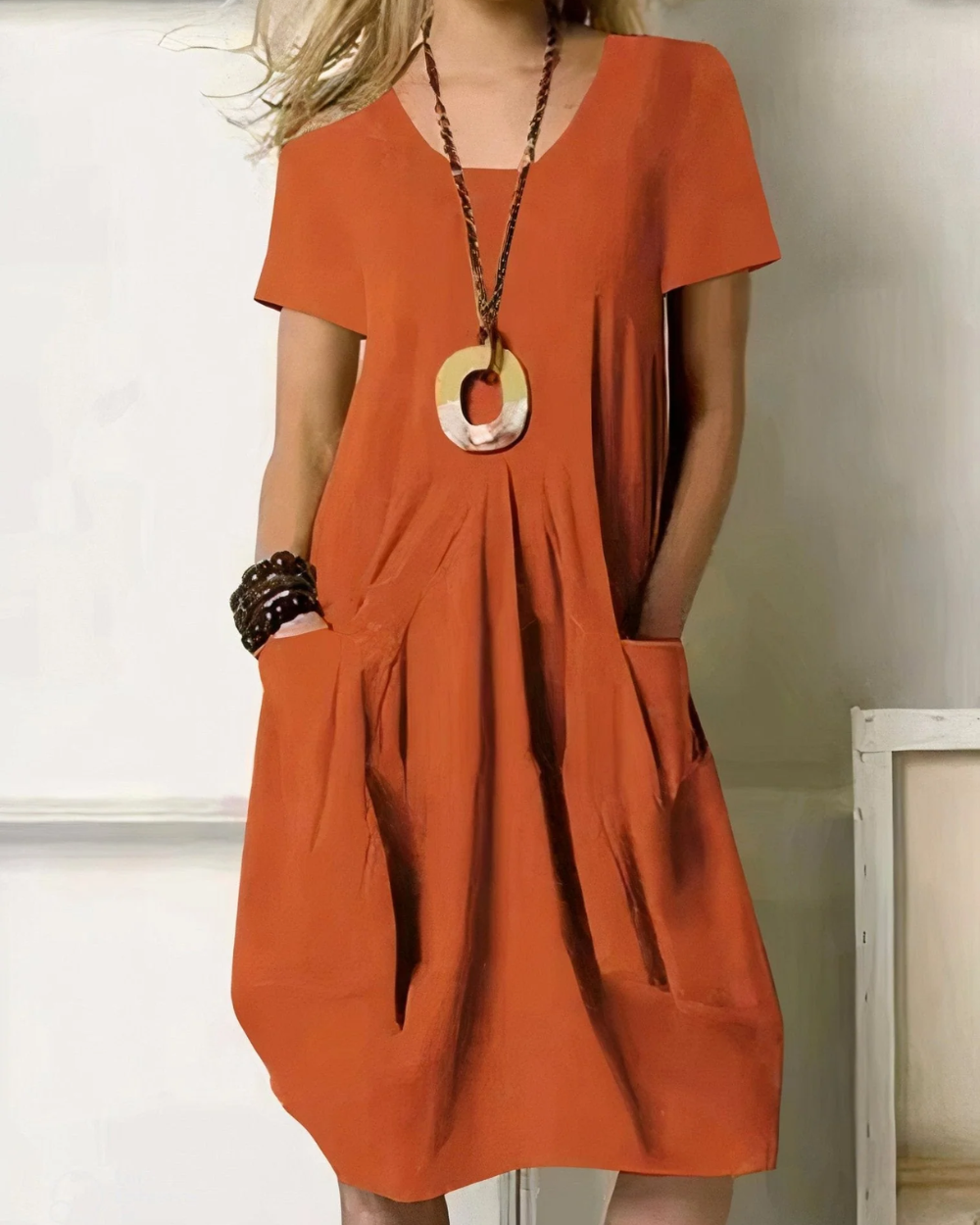 Vestido elegante que cobre a barriga