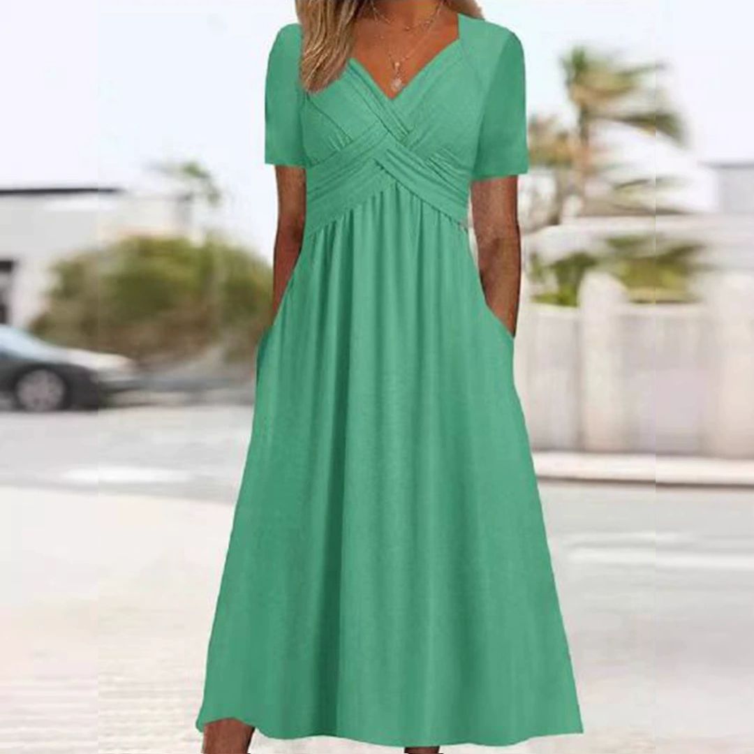 Vestido com decote em V que cobre a barriga