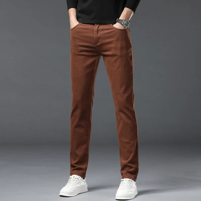 Calças de ganga elegantes em denim elástico