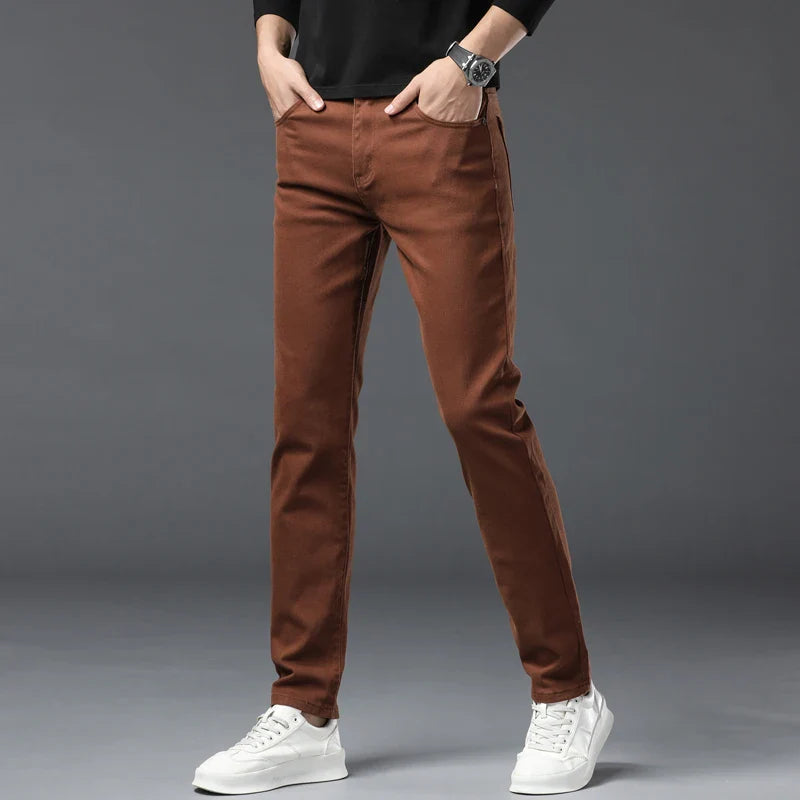 Calças de ganga elegantes em denim elástico