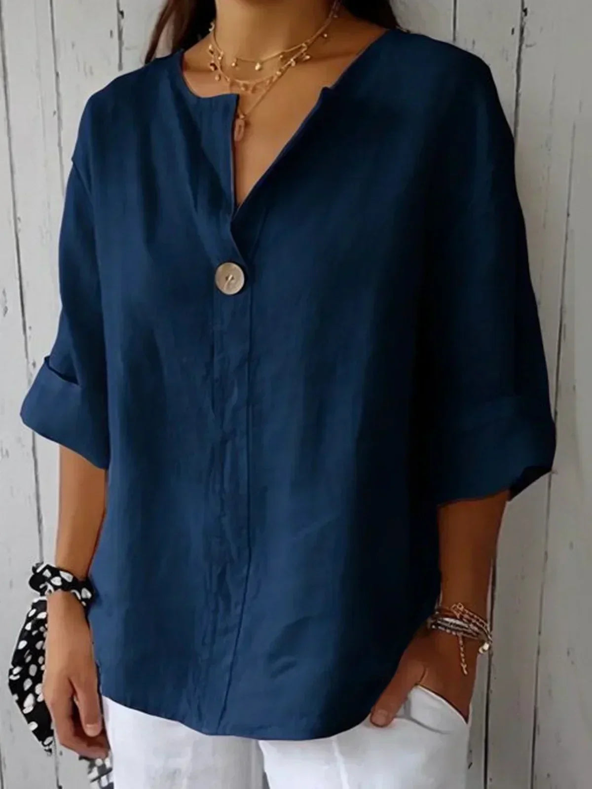 Blusa comprida com decote em V