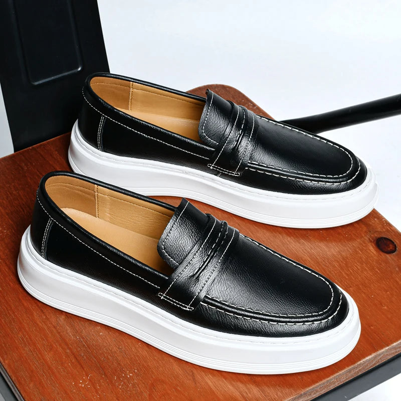 Sapatos de barco em pele