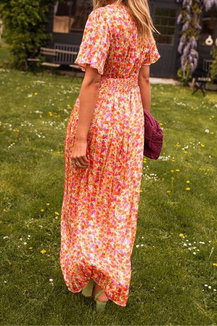 Vestido maxi elegante com decote em V