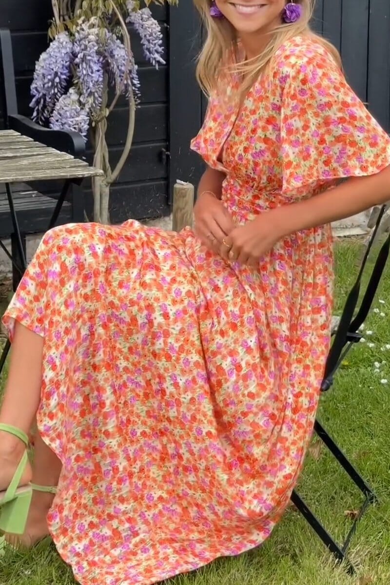 Vestido maxi elegante com decote em V